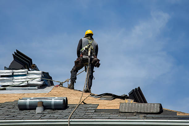 Professional Roofing technician working in Dale, PA